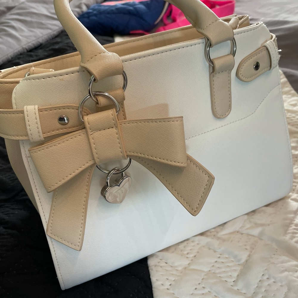 Claire’s Cream two tone girls bag with locket and straps